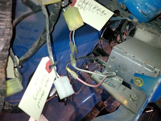 LC-20150329-016 - Lower Dash Light Removal Pic 1 (Behind the dash taken from D Side) (Mud).webp