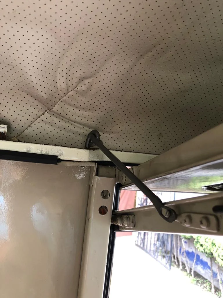 Left_Bifold_Door_Holder_1965_FJ40.jpeg