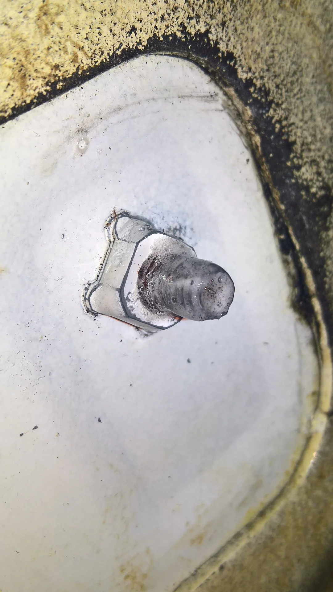 License plate screw gelled phosphoric acid.jpg