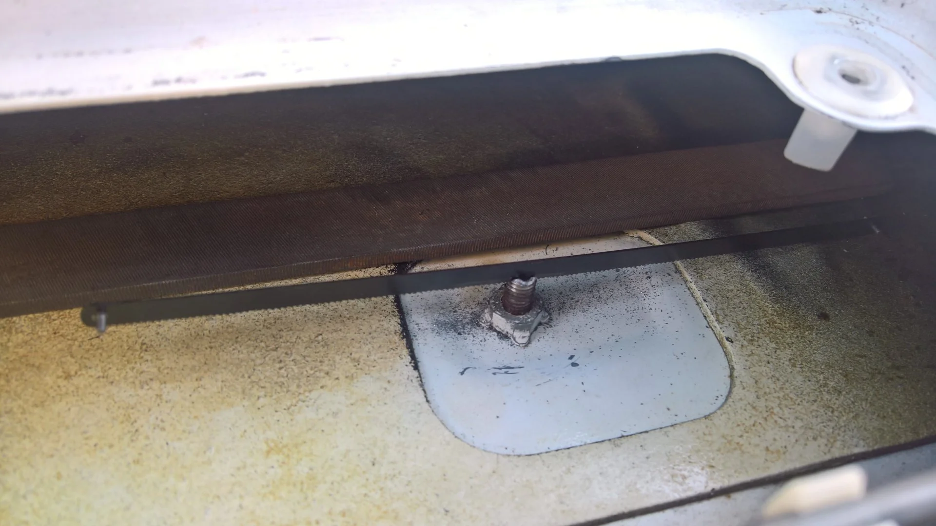 License plate screw hacksaw.jpg