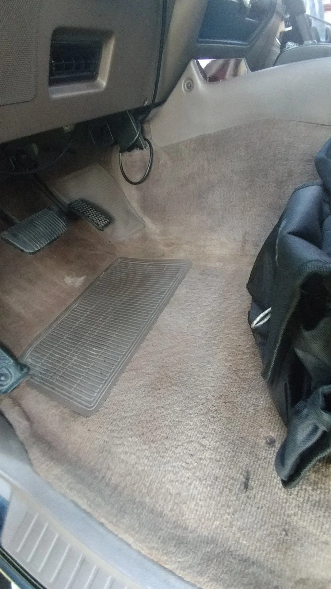 LX Driver front carpet.webp