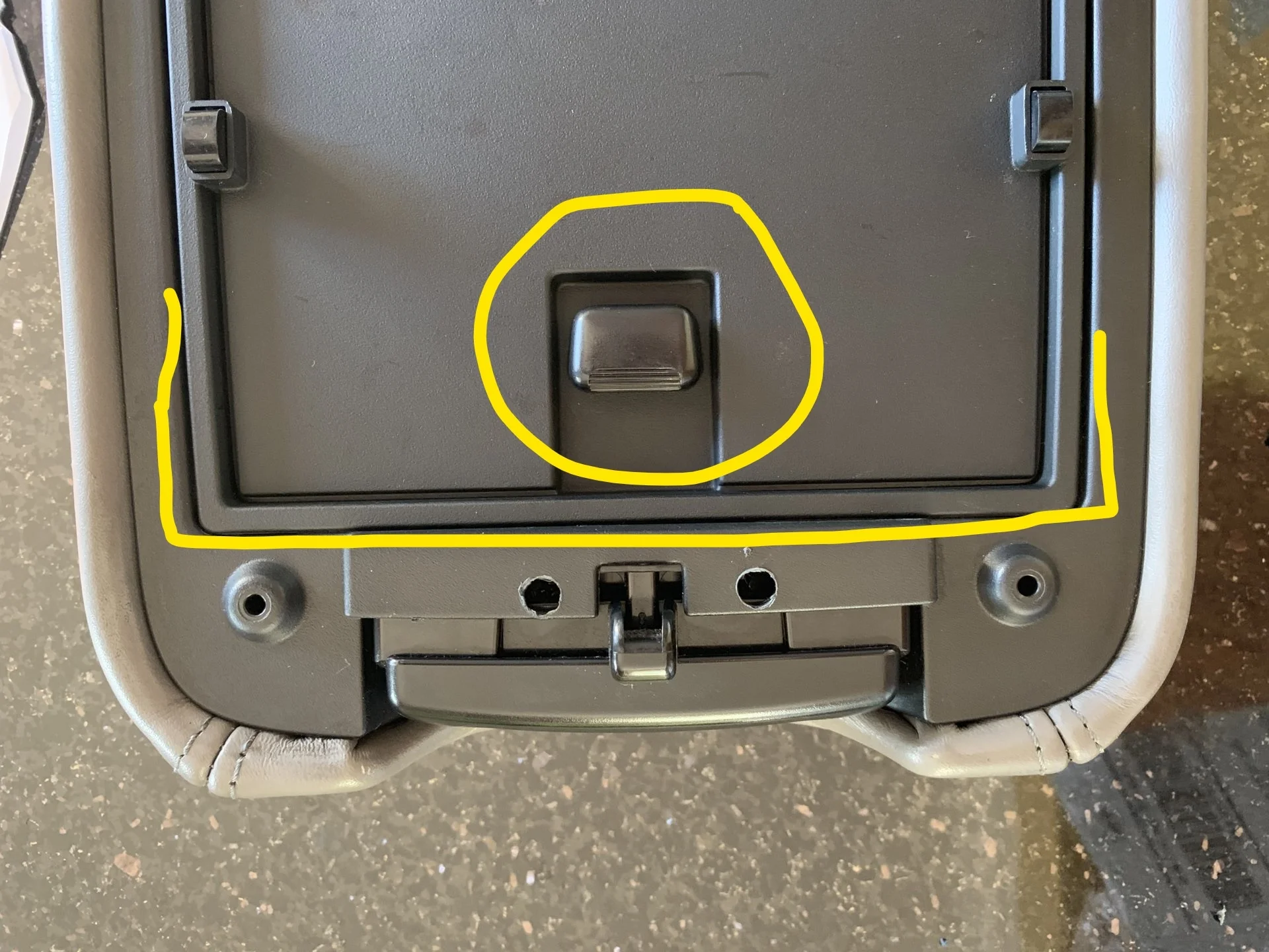 LX470 center console cupholder latch.jpg