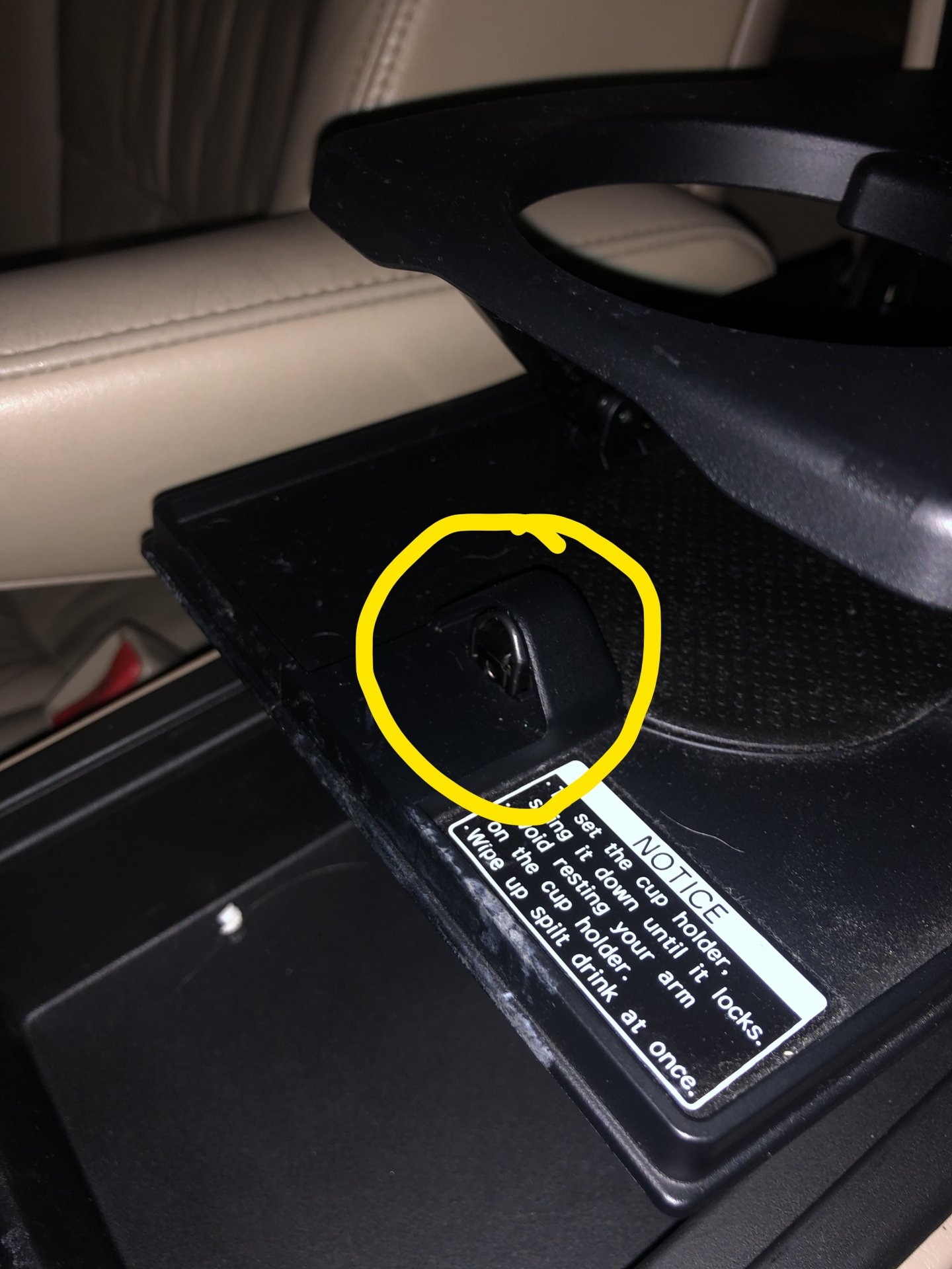 LX470 center console cupholder latch2.jpg