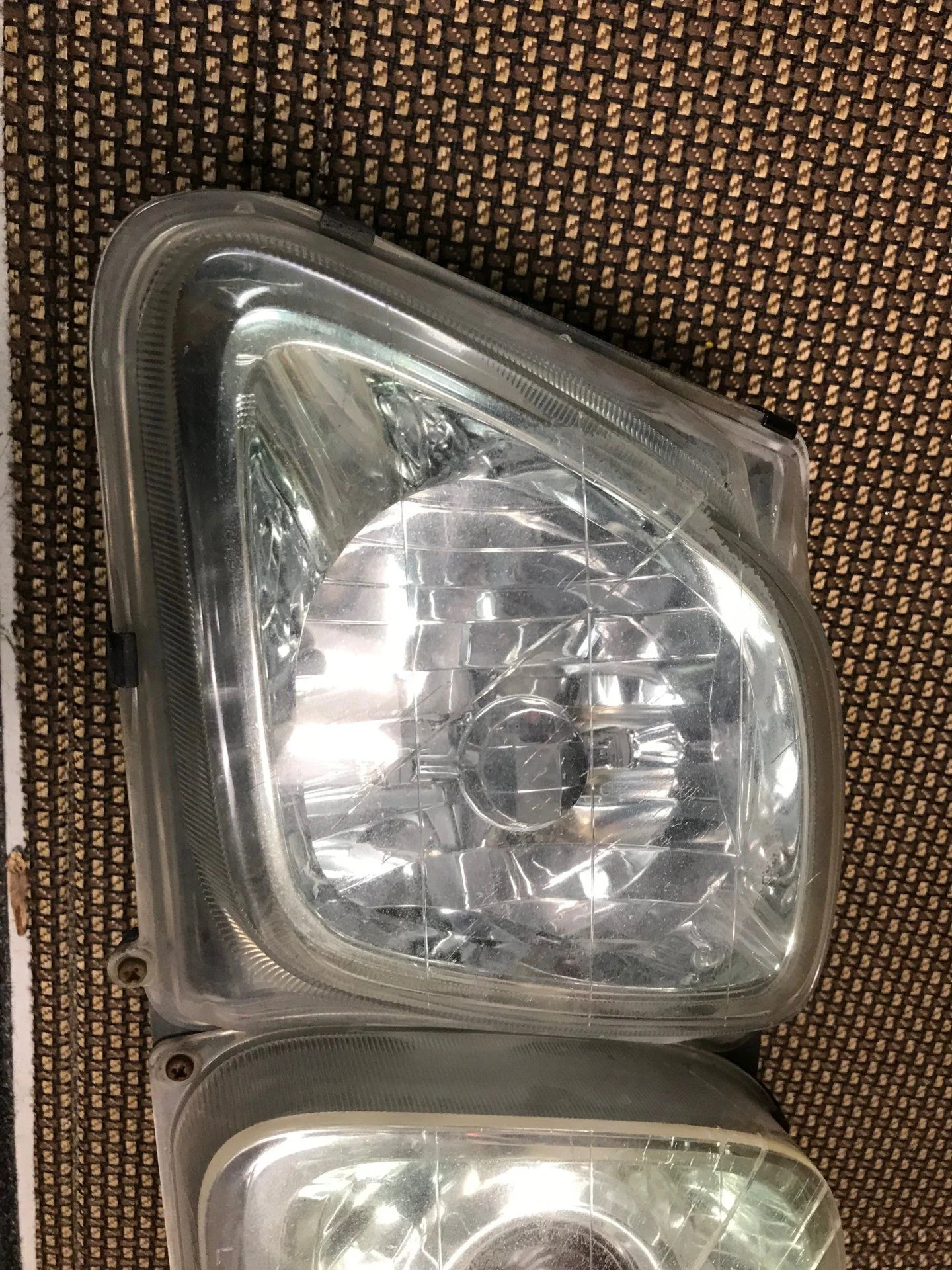 LX470 headlight lens.webp