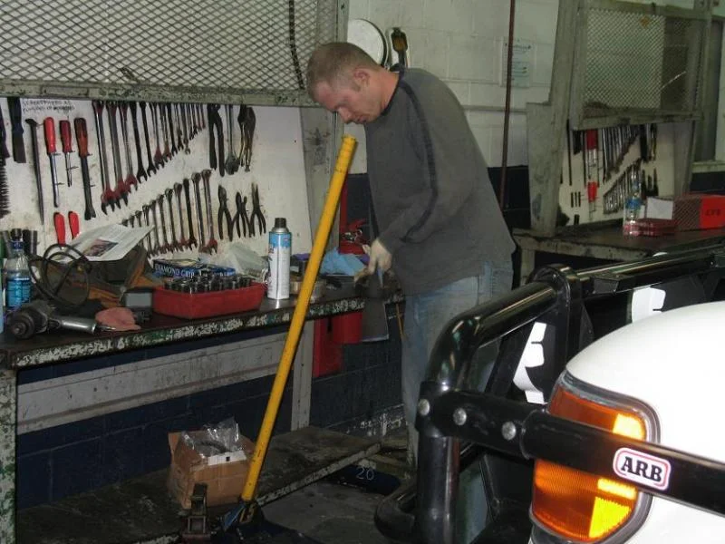 Mike's cleaning the arm.webp