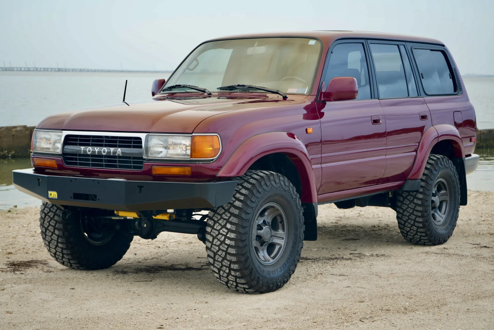 1994 Toyota Land Cruiser FZJ80 185k miles. Baselined. Modded. Tampa, Florida. Red on Brown Cloth.
