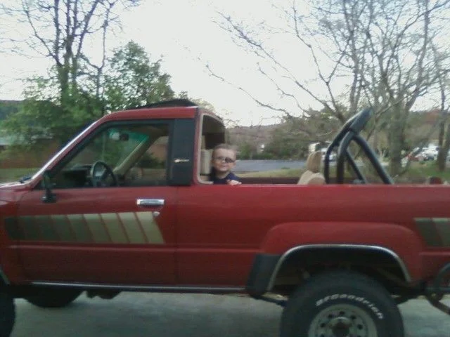 Nicholas with the top down.webp