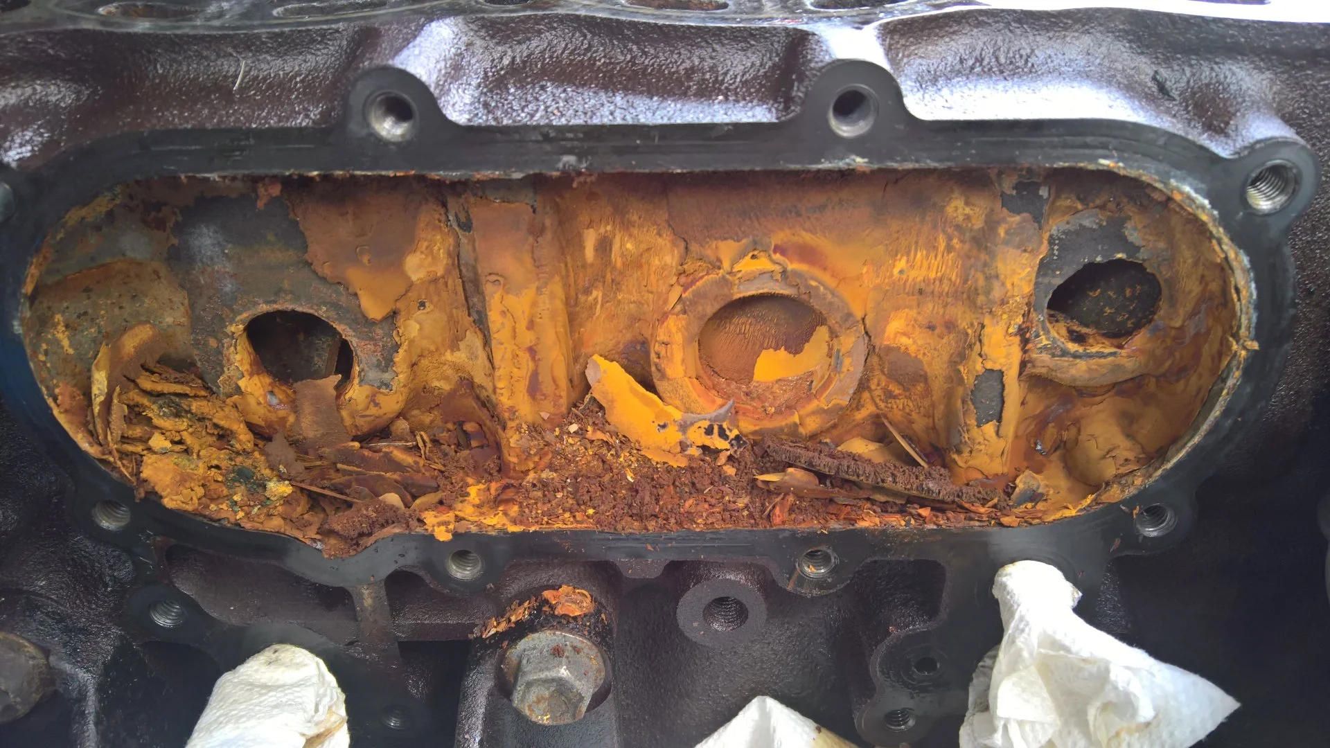 Oil cooler full of flaking block sealer.jpg