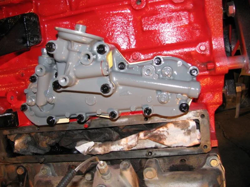 Oil cooler with filter housing installed.webp