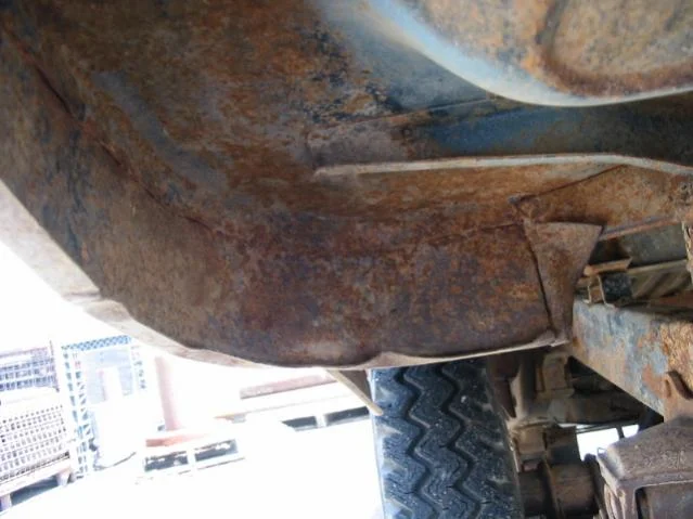 pass side rear cab corner underneath.webp
