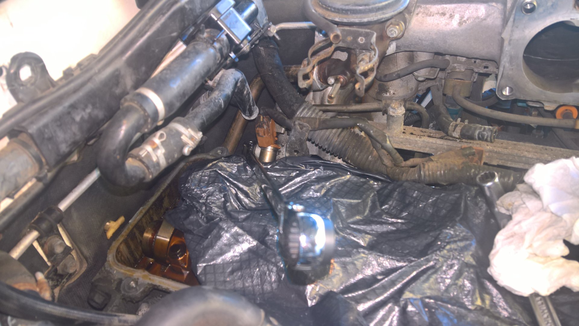 PHH pipe bottom bolt from Passenger side valve cover removed.jpg