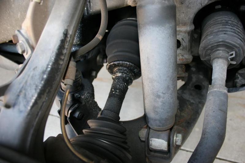 Picture 24 - CV boot leaking 1.jpg