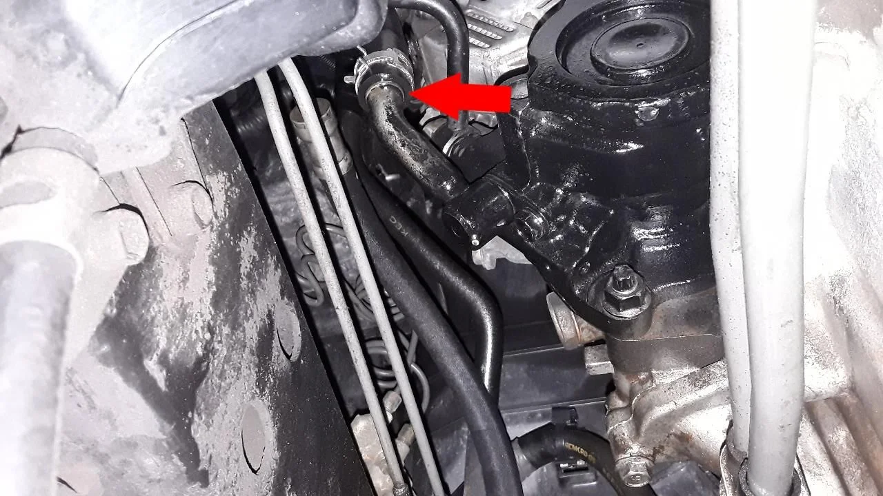 Power steering return hose leak.webp