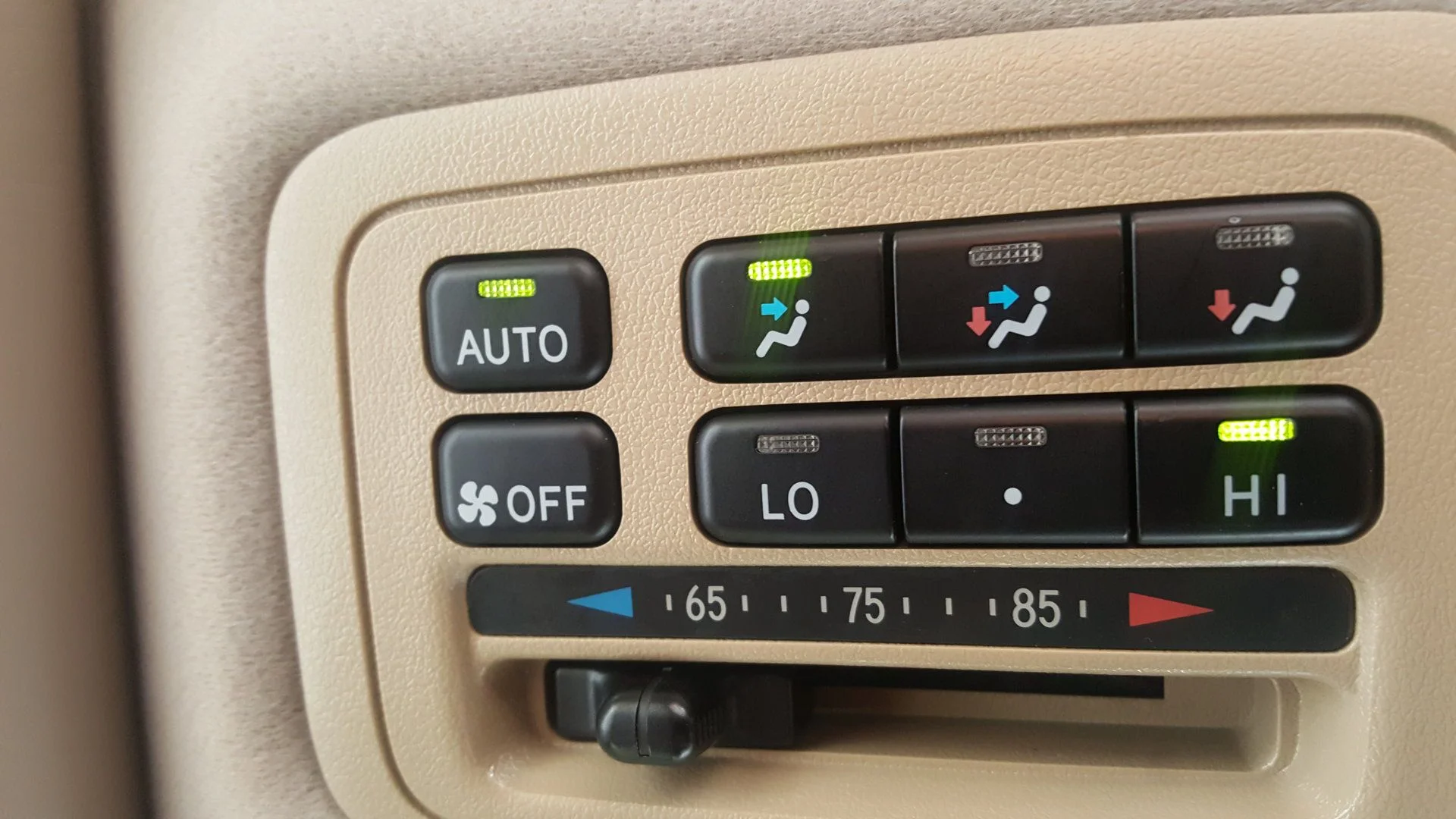 Rear AC controls.webp