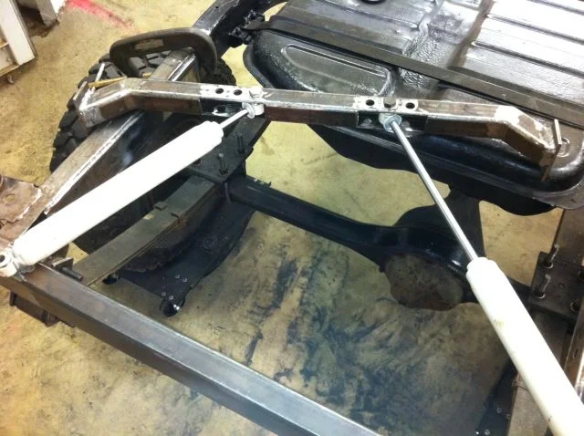 rear shock mount on mud.webp