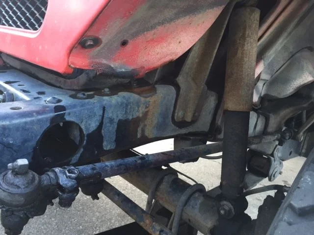 Red - Drivers front frame area.webp