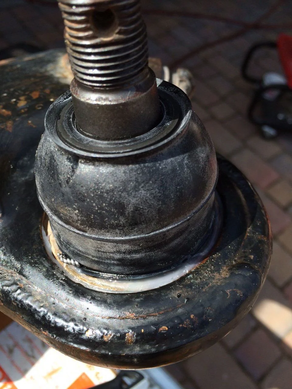 Safety wired balljoint boot.webp