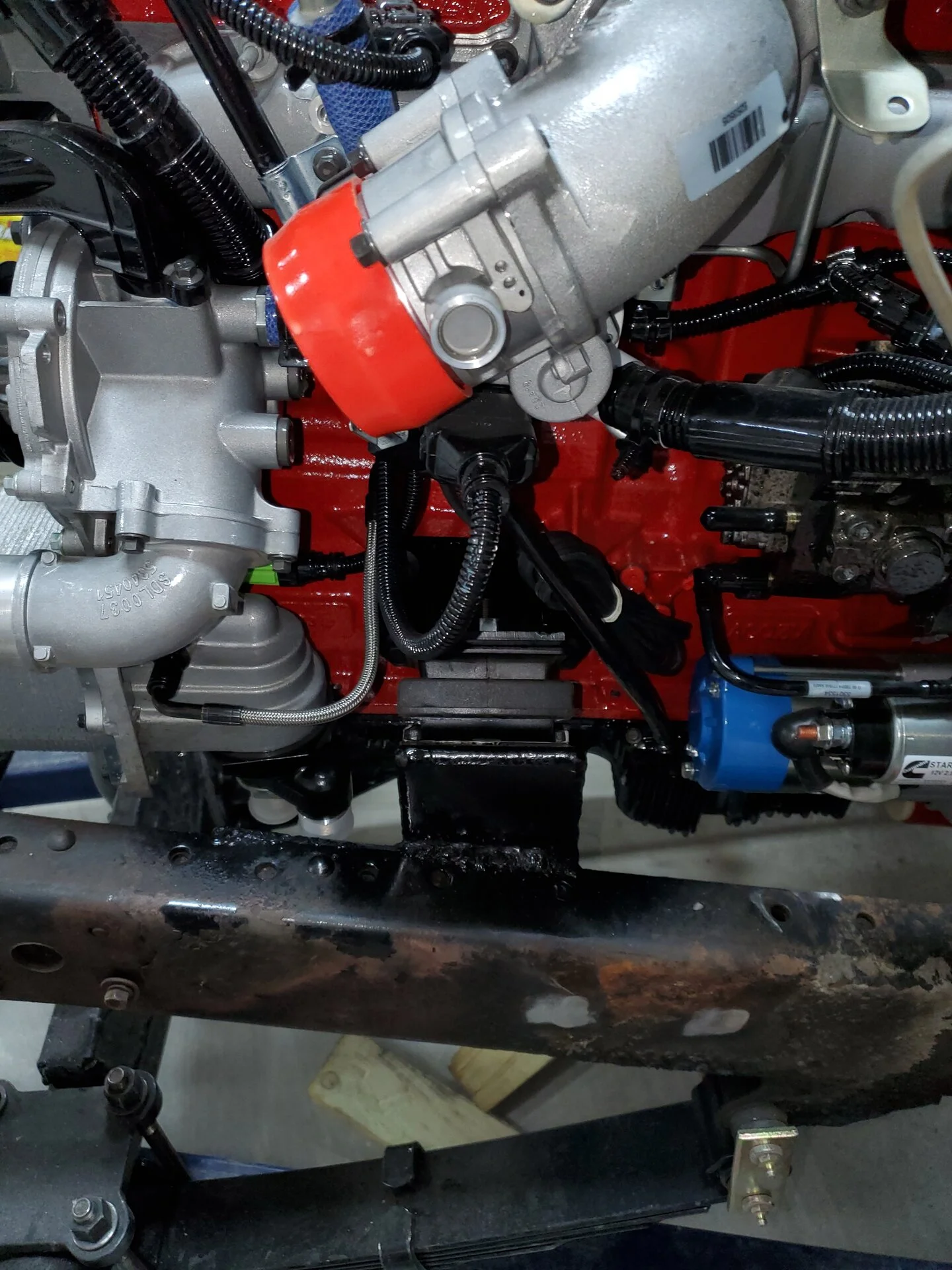 SET DOWN ON THE FRONT MOTOR MOUNTS.webp