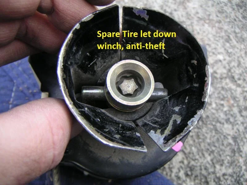 Spare tire winch lock.webp
