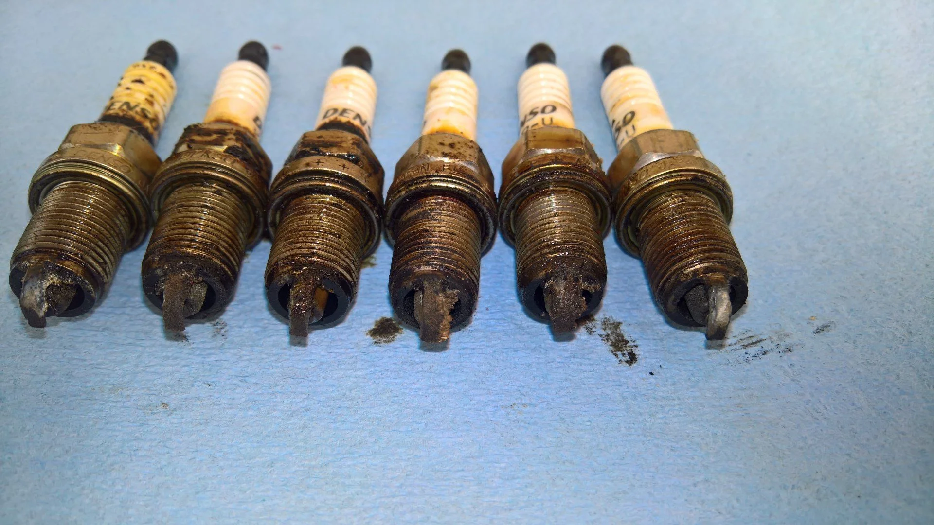 Spark plugs side electrode deposits.jpg