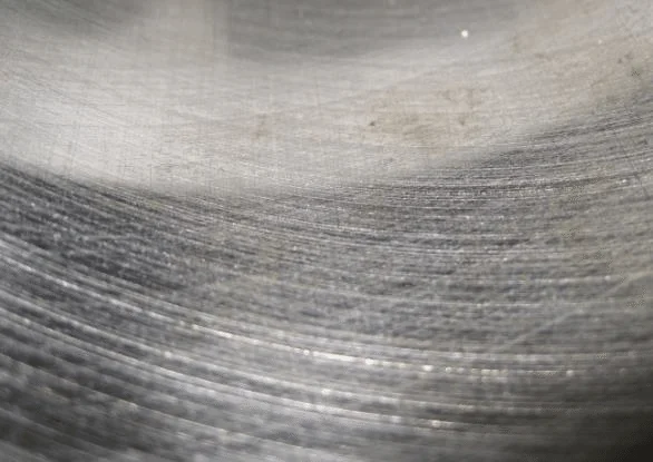 The-morphology-of-the-untreated-cylinder-liner-after-honing-a-photograph-and-b.webp