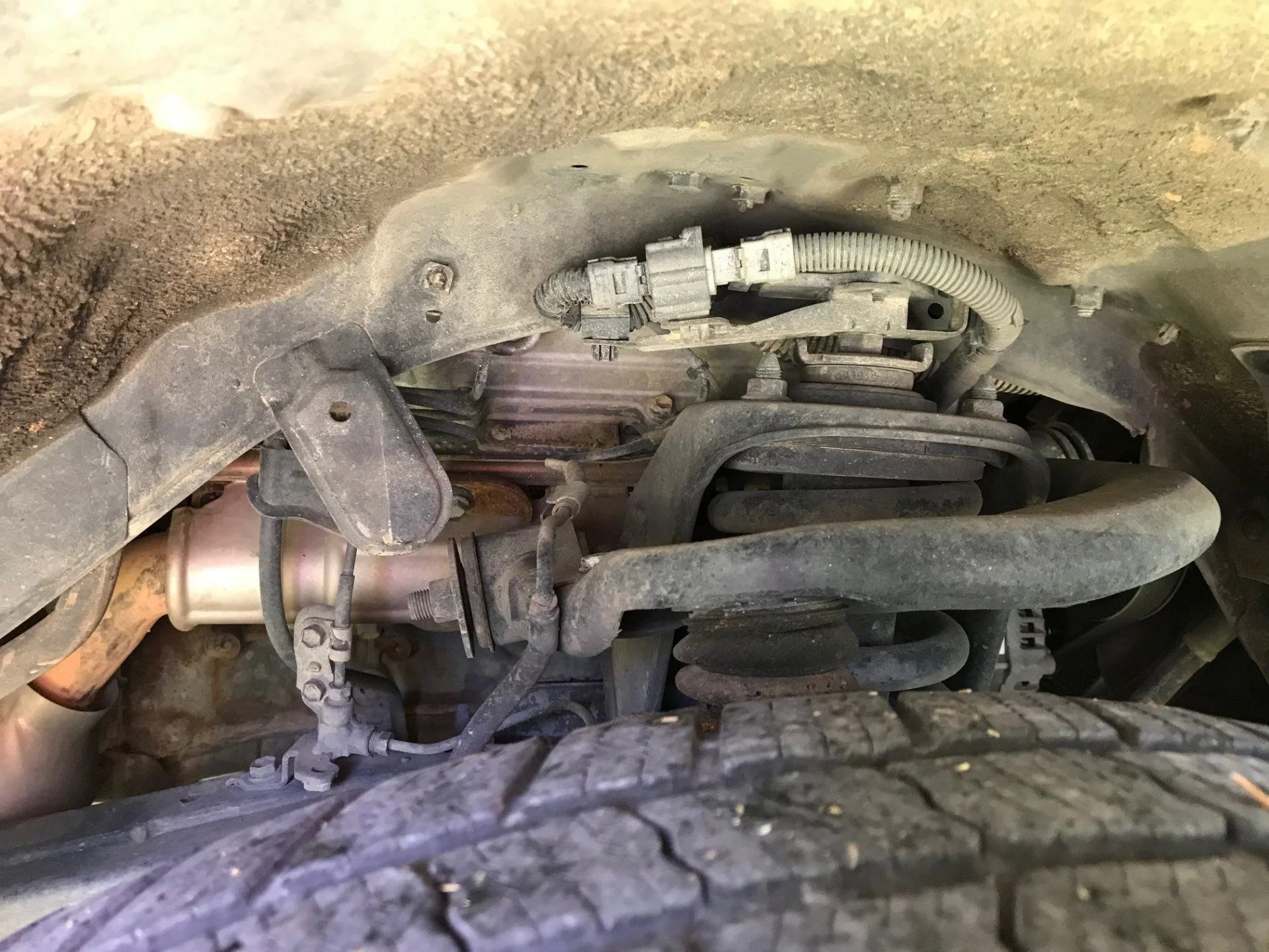 under LF wheel well.jpg
