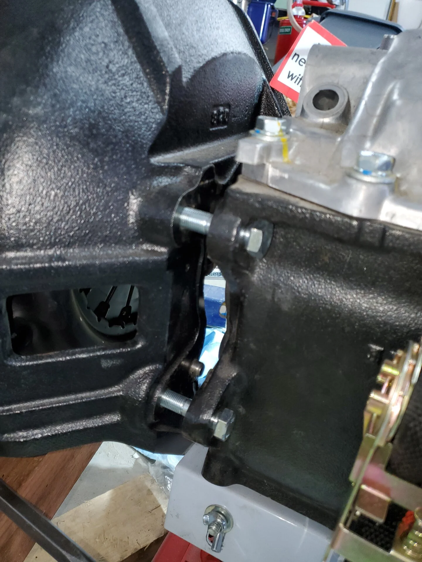 USED LONGER BOLTS TO PULL THE TRANSMISSION UP.webp