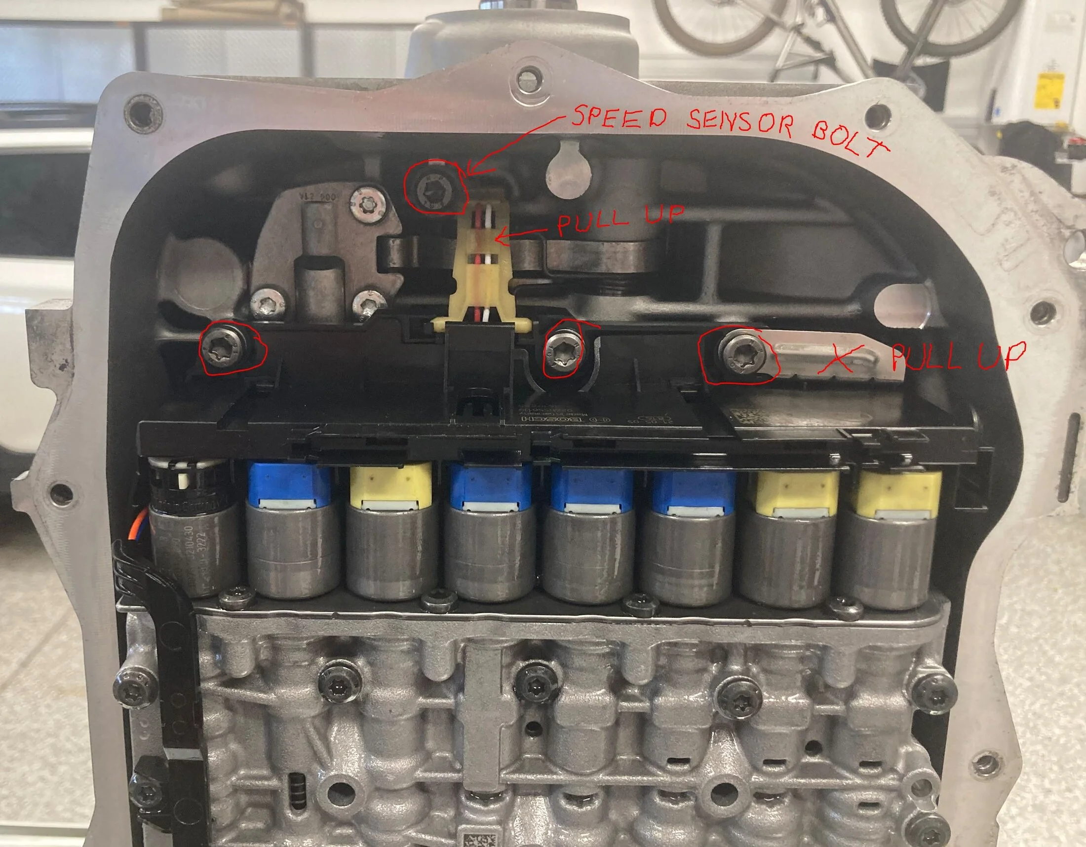 Valve Body Solenoid End Bolt Locations.JPG