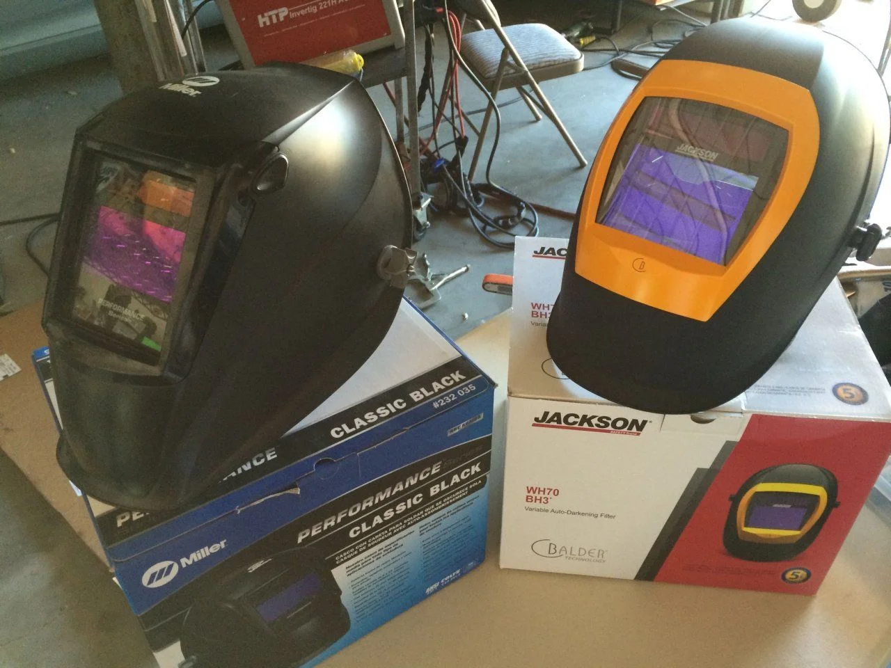 Welding helmet side by side.webp