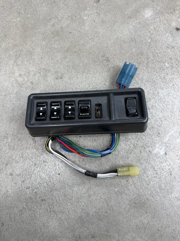 FJ62 Toyota Land Cruiser OEM Switch Panel Window and Lock Switch
