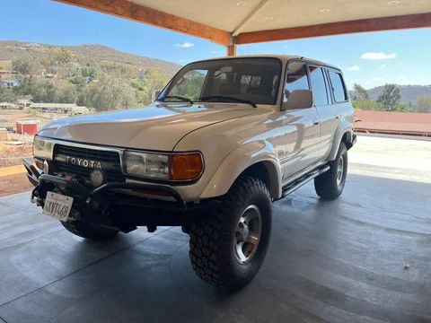 1994 Factory Locked, 163k miles clean, white with grey int.