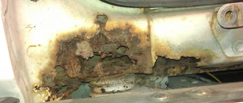 Rear_Driverside_Body_Mount_Rust.webp Rear_Driverside_Body_Mount_Rust.webp