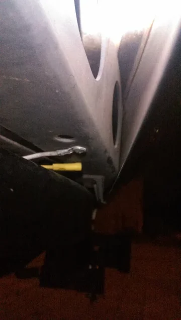 bumper hole from under car.webp