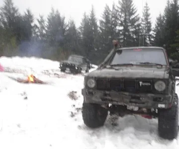 My 80 while snow campin. My buddys '66 Ford in the background.