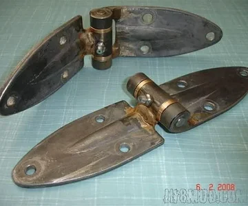 Modified hoodhinges (phosphor-bronze bushes and grease nipples) prior to painting