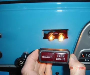 The left hand light should always light briefly while I'm cranking the engine as a "bulb check"