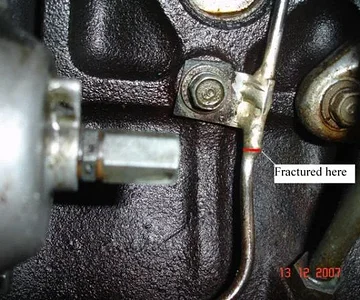 This leak was hard to find. It was on the "below atmospheric" side of the fuel pump so I had to first pressurise the fuel tank in order to get fuel to leak out. (Actually the fracture was just a bit higher than the red line - .........At the edge of the b