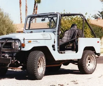 The cage is done and the seats are in.  The bezel is that way to piss you off.