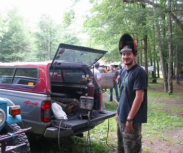 Tom about to weld on Dan's center arm with Scott and Tom2 in the background