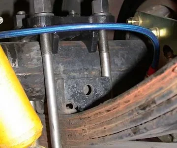 Rear U Bolt Flip & Custom Brake Line on the Passenger Side