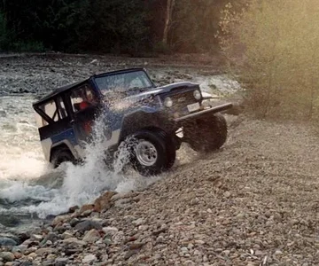 crossing a river . to get to a sweet campsite .