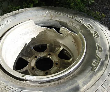 The left front rim after the sudden deceleration against a 4 ton boulder.