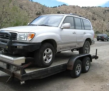 Changed out three rims/tires and drove it onto the trailer. Here it's loaded in Walker CA. for the trip home.