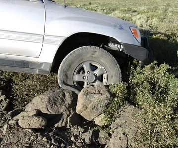 The right front rim as it sat after the crash. Blew out the Biltsein as well as the tire on this corner.
