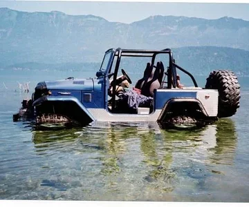 not sure what i was doing but i parked it in the river. look closely and ya can see my cd player under my seat ,river was deeper in another spot and i submurged the player .after it dried it still worked .