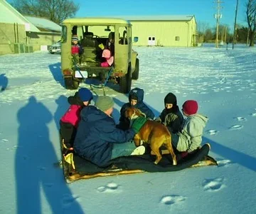 redneck snow sledding