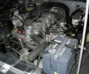 P8260110 Two batteries=24volt - still fabing the exhaust header and intercooler plumbing at this point