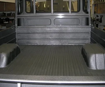 We (read Ryan) added inner walls to the box to prevent dents from cargo