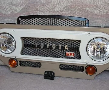 Bib, bezel, lights, grill