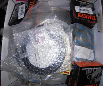 Got a box of parts, including Longfield Wipers, Timkin Wheel Bearings adn races, Toyota trunion bearings and races, Marlin axle seals, etc.